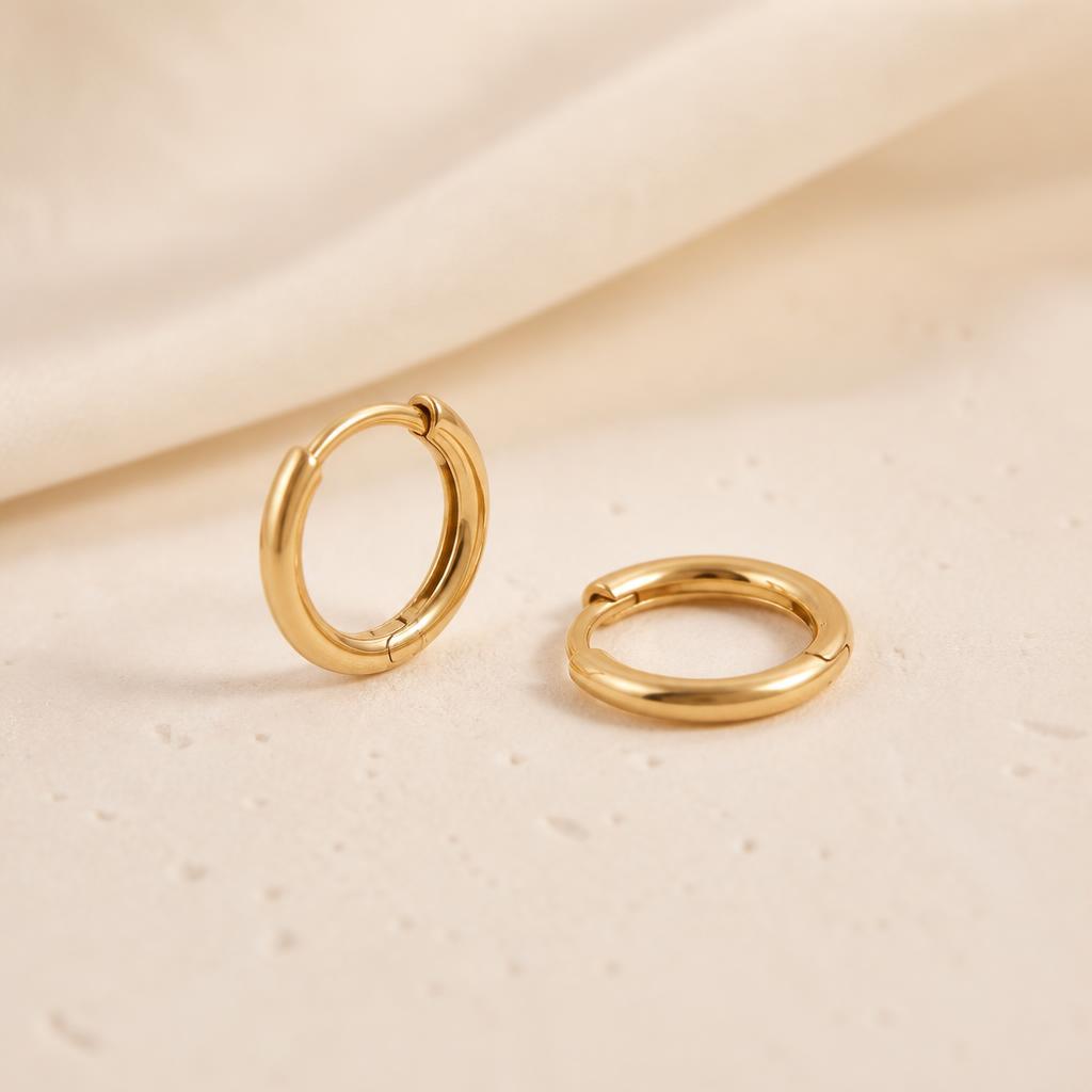 Kiara Everyday Hoops photographed on a warm ivory background